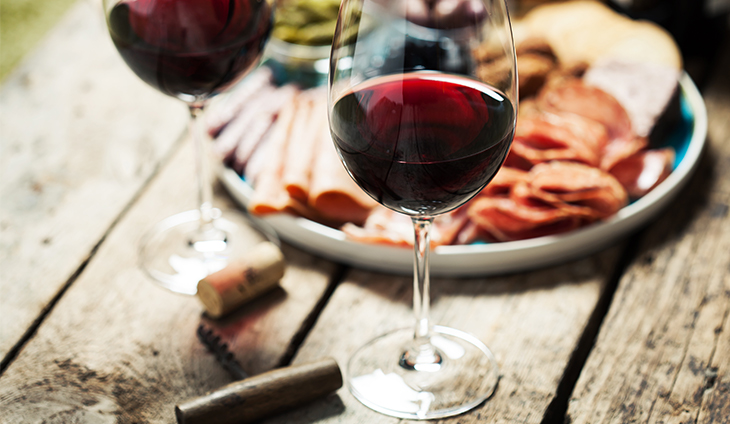 Glass of Red Wine with food.
